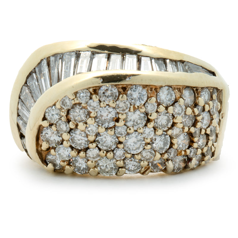 14 Karat Yellow Gold Round and Baguette Cut Diamond Swirl Ring