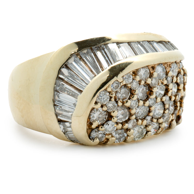 14 Karat Yellow Gold Round and Baguette Cut Diamond Swirl Ring