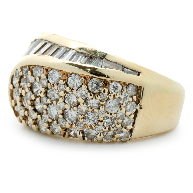 14 Karat Yellow Gold Round and Baguette Cut Diamond Swirl Ring
