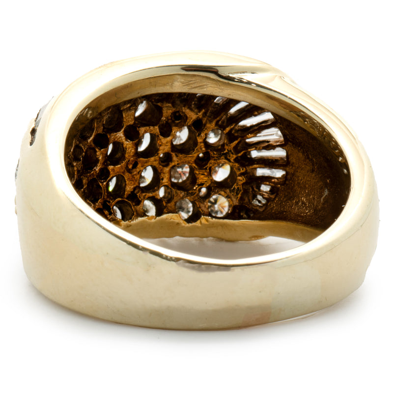 14 Karat Yellow Gold Round and Baguette Cut Diamond Swirl Ring