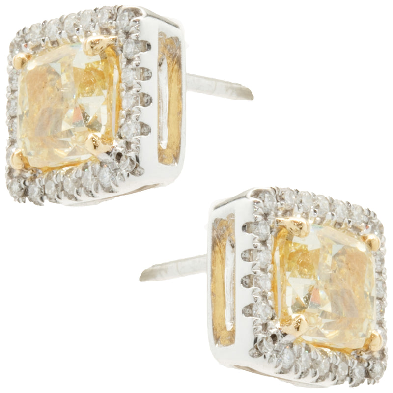 18 Karat White & Yellow Gold Fancy Yellow Diamond Stud Earrings with Diamond Halos