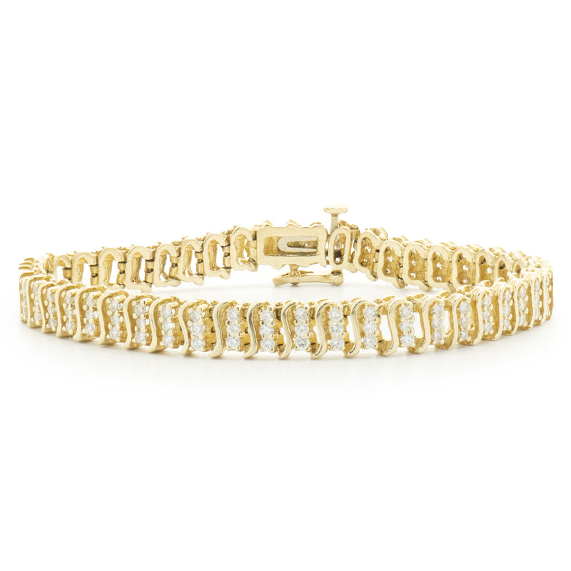 14 Karat Yellow Gold Tripple Row Diamond S Link Tennis Bracelet