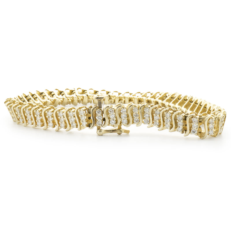 14 Karat Yellow Gold Tripple Row Diamond S Link Tennis Bracelet