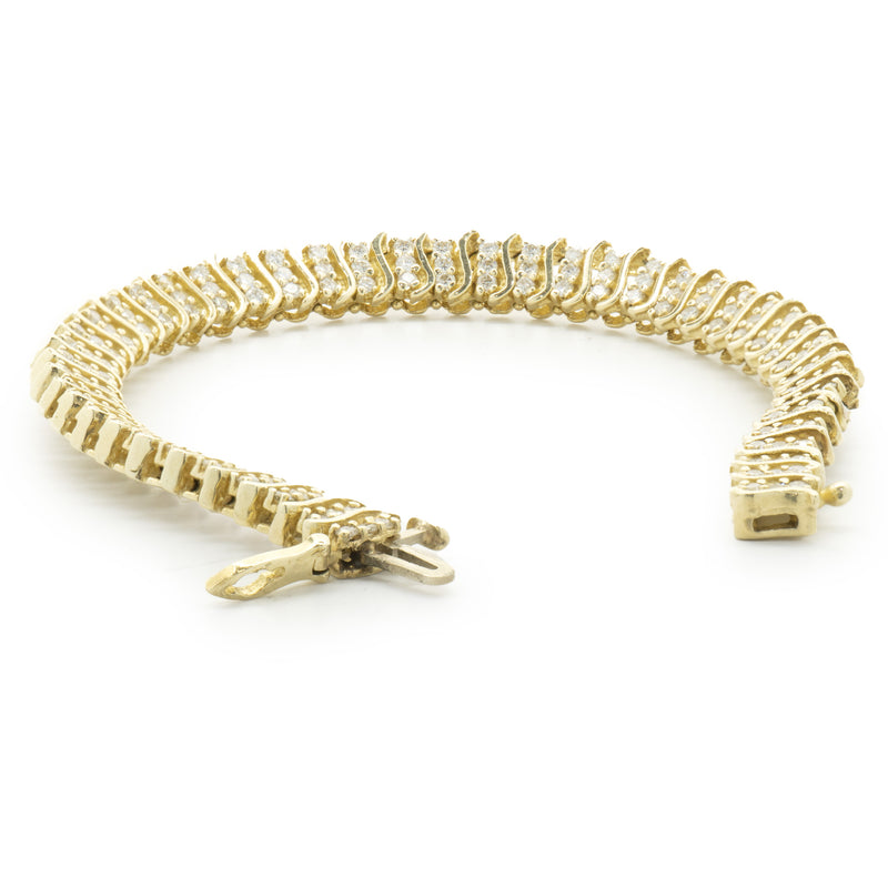 14 Karat Yellow Gold Tripple Row Diamond S Link Tennis Bracelet