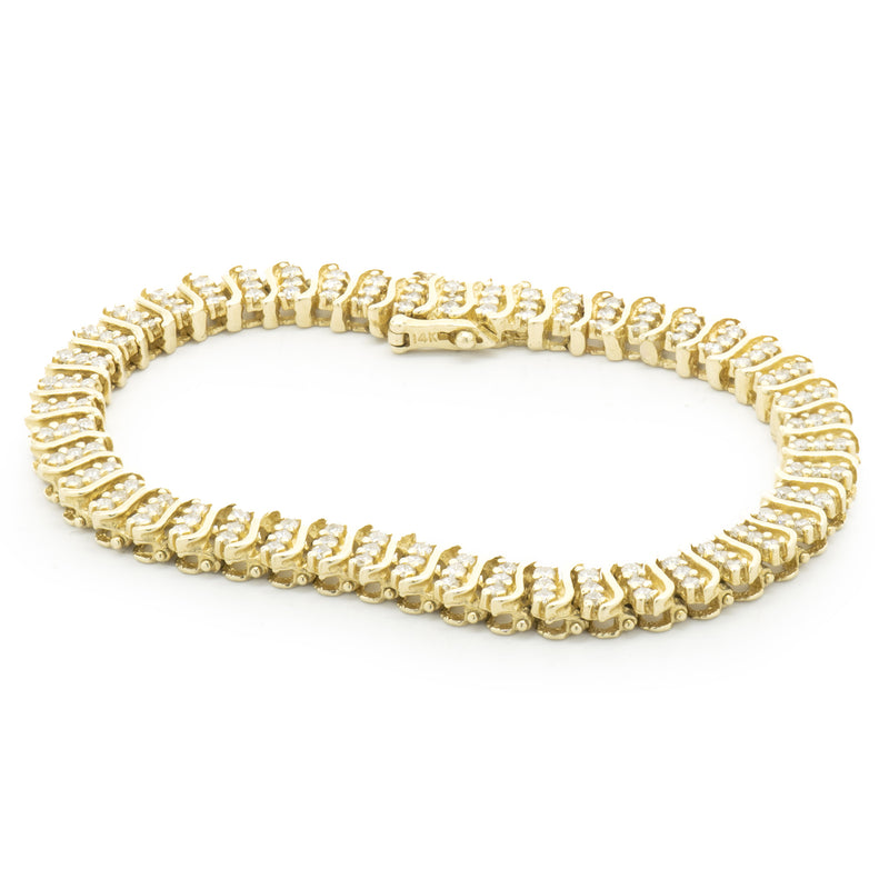 14 Karat Yellow Gold Tripple Row Diamond S Link Tennis Bracelet