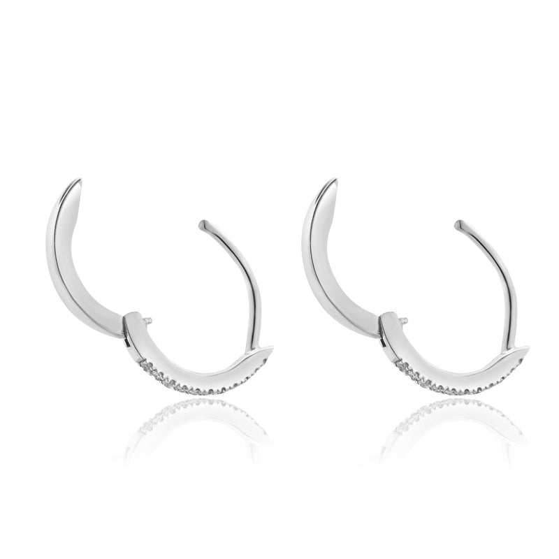 Movado 14 Karat White Gold Small Diamond Huggie Earrings