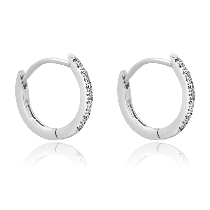 Movado 14 Karat White Gold Small Diamond Huggie Earrings