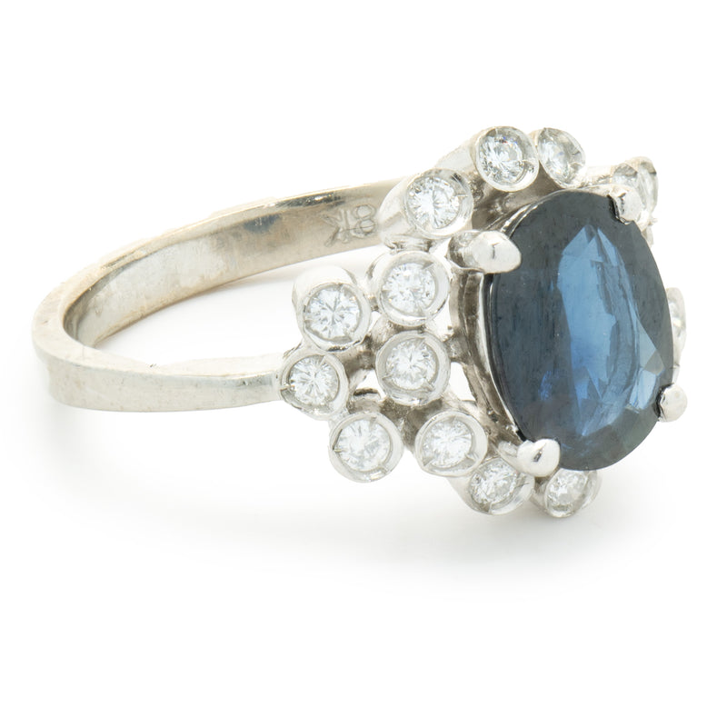18 Karat White Gold Sapphire and Bezel Set Diamond Ring