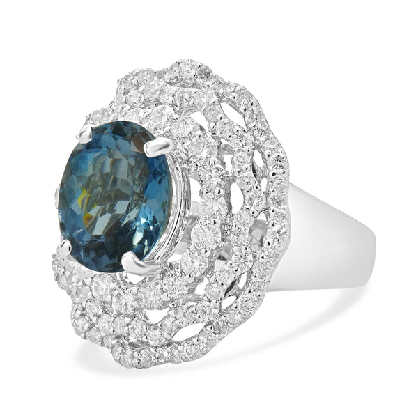 18 Karat White Gold Blue Topaz and Diamond Ballerina Ring