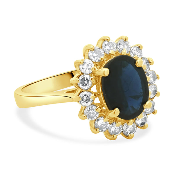 14 Karat Yellow Gold Oval Cut Sapphire and Diamond Ring