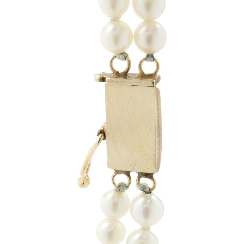 14 Karat Yellow Gold Double Strand Pearl Necklace with Multi Colored Gemstone Stations
