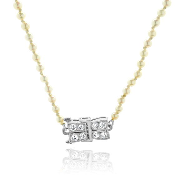 Platinum & 18 Karat White Gold Graduated Pearl Necklace with Pearl and Diamond Clasp