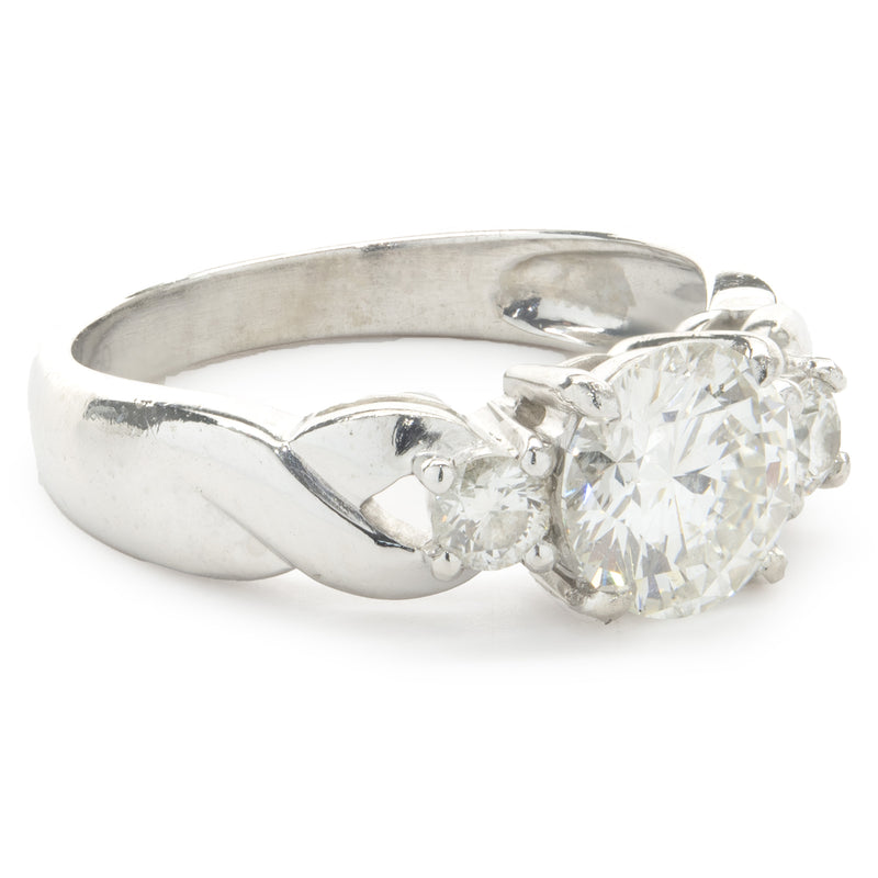 Platinum Round Brilliant Cut Three Diamond Engagement Ring