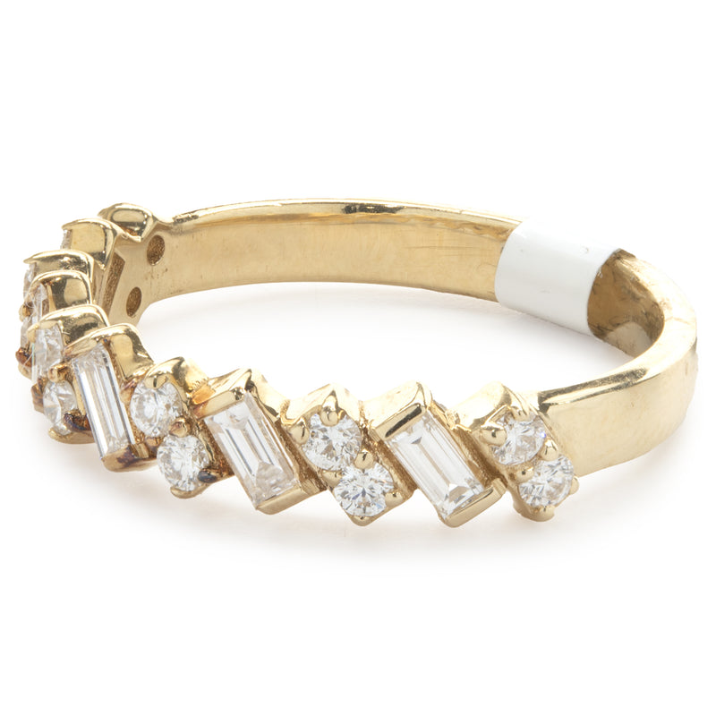 14 Karat Yellow Gold Round and Baguette Diamond Tilt Band