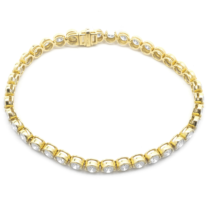18 Karat Yellow Gold Bezel Set Diamond Tennis Bracelet