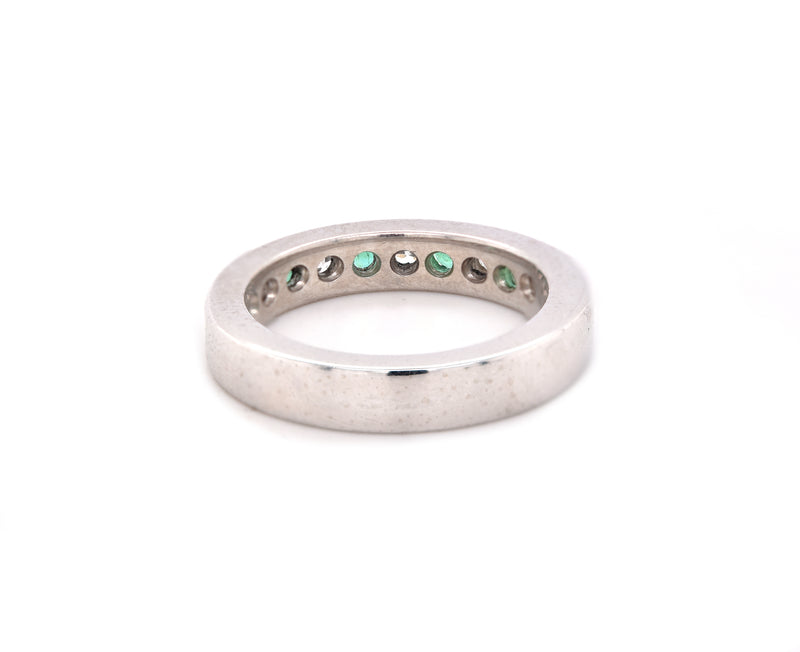 Platinum Channel Set Diamond and Emerald Band