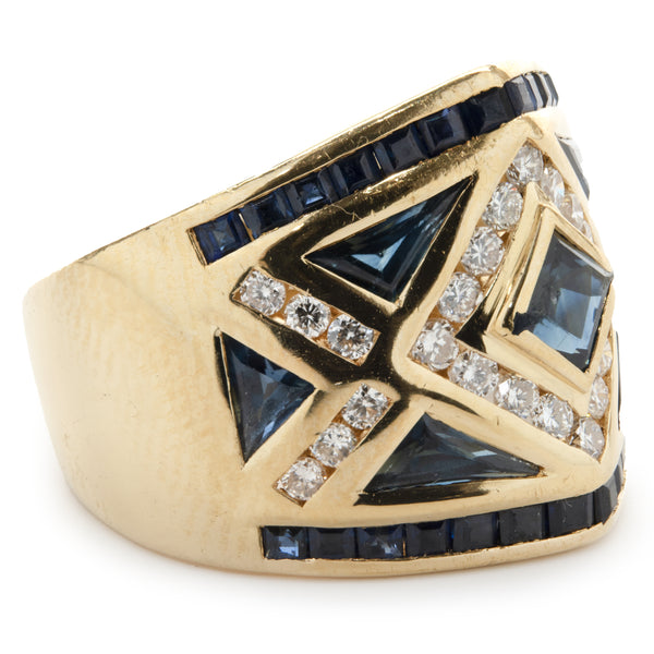 18 Karat Yellow Gold Channel Set Sapphire and Diamond Ring