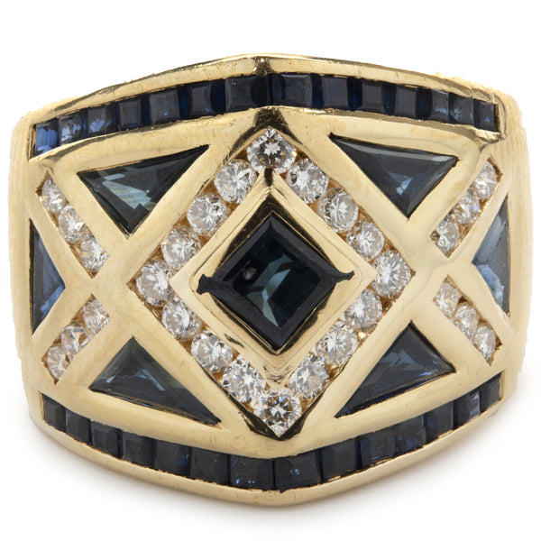 18 Karat Yellow Gold Channel Set Sapphire and Diamond Ring