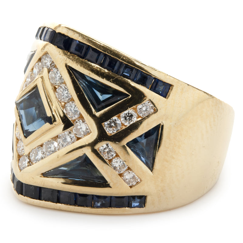 18 Karat Yellow Gold Channel Set Sapphire and Diamond Ring