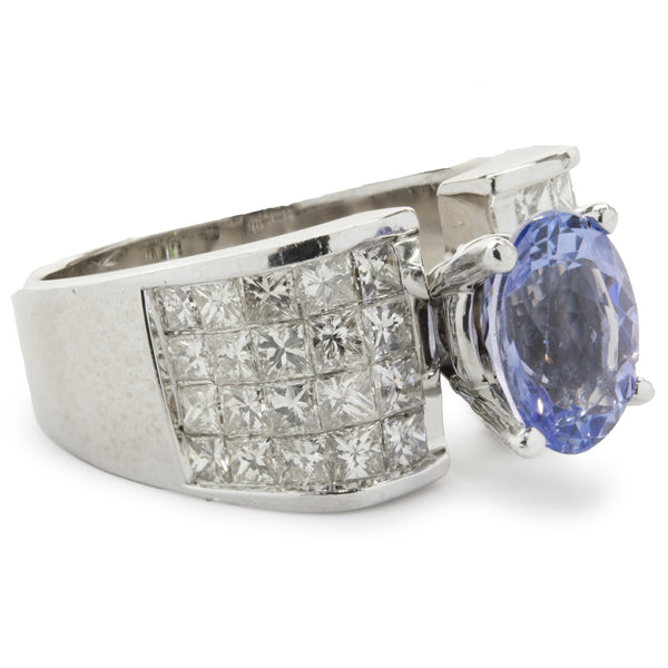 14 Karat White Gold Tanzanite and Invisible Set Diamond Ring