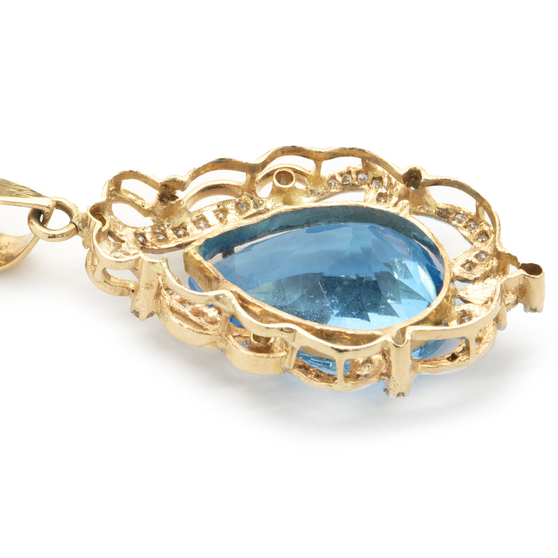 18 Karat Yellow Gold Pear Cut Blue Topaz and Diamond Freeform Pendant
