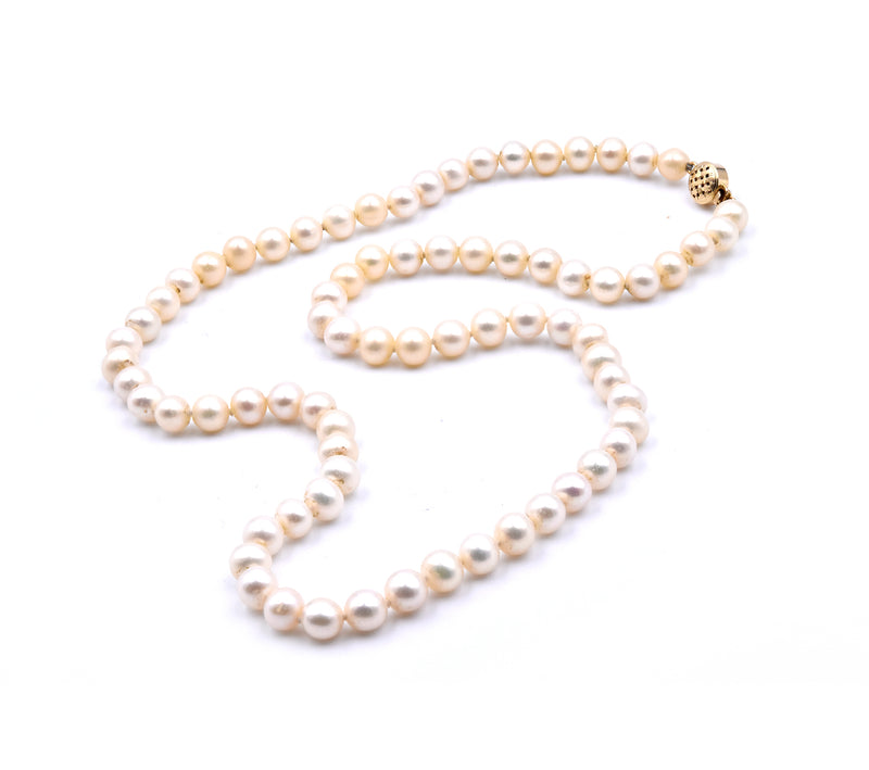 Ivory Semi Round Pearl Strand Necklace with 14 Karat Yellow Gold Clasp